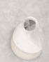 A monochrome pencil-style drawing of a rounded vase or pot viewed from above, with two translucent leaf shapes layered over it on a textured light gray background.