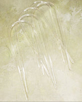 Give clear acrylic trellises on a textured green surface